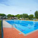 Terraced House In A With A Pool Bibione
